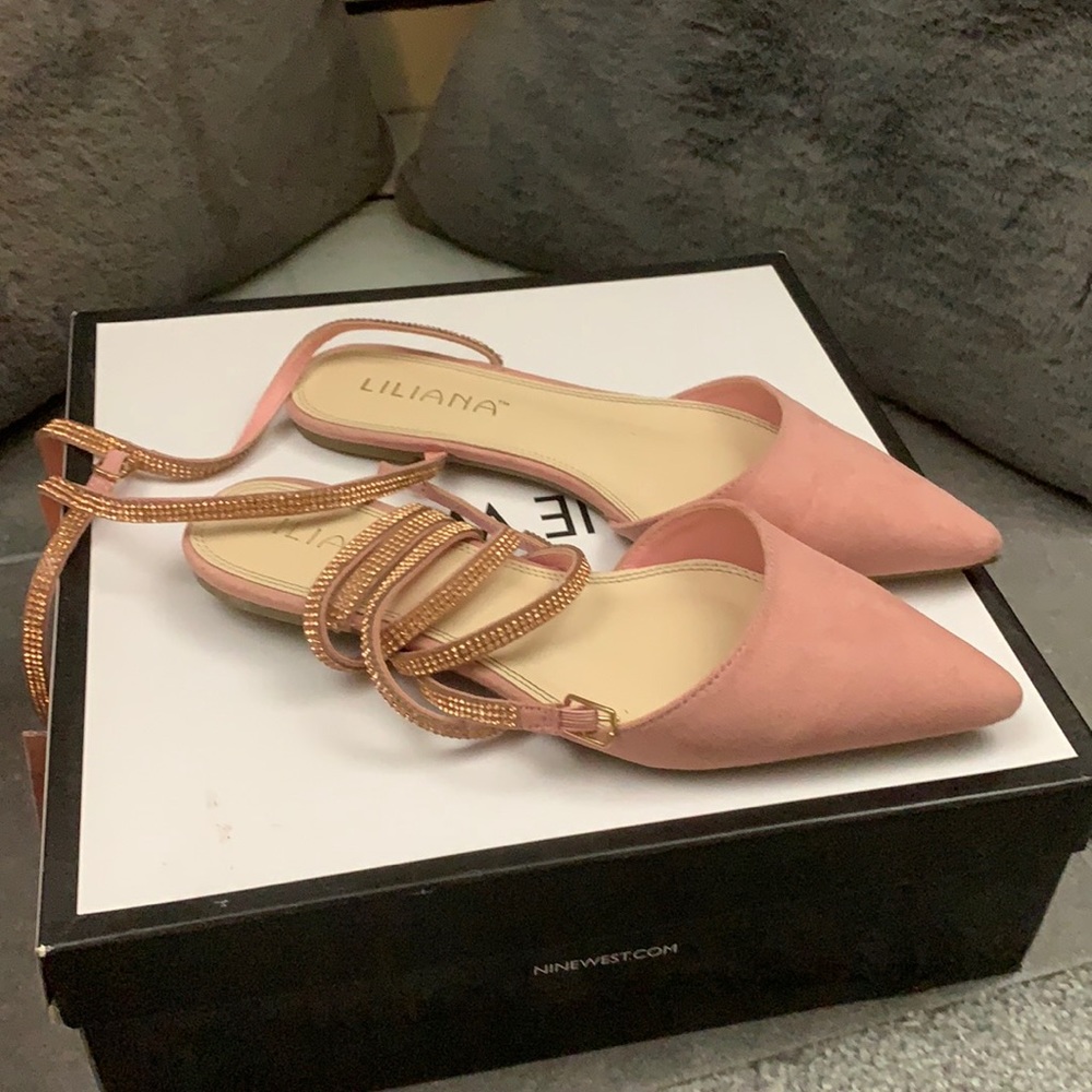 Pink rhinestone lace up flat.